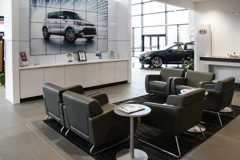 New Freedom KIA Lounge Area design by Peggy Lovio of Omega Commercial Interiors.