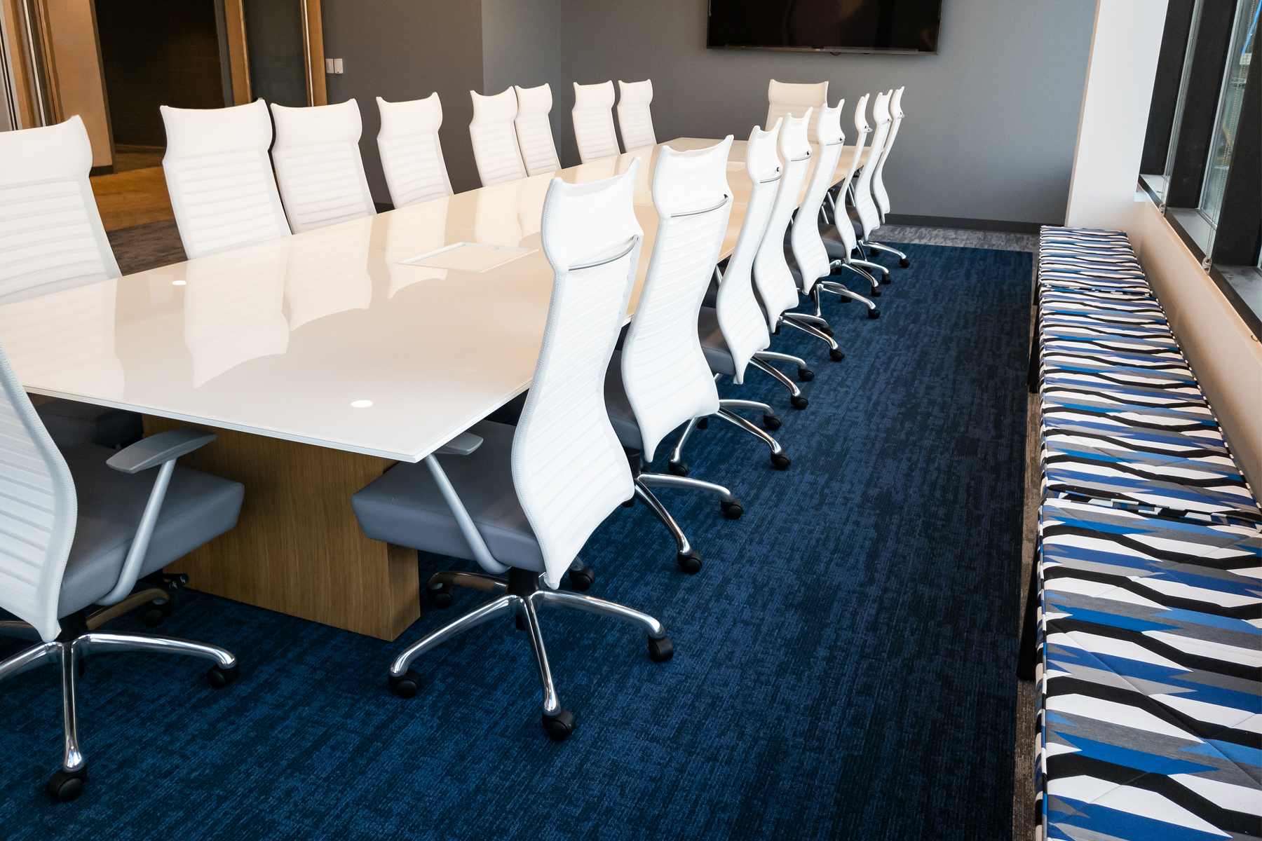 Nucraft® Myne™ Conference Table, Source International® Purl™ Chairs and Kimball® Fixit™ Benches