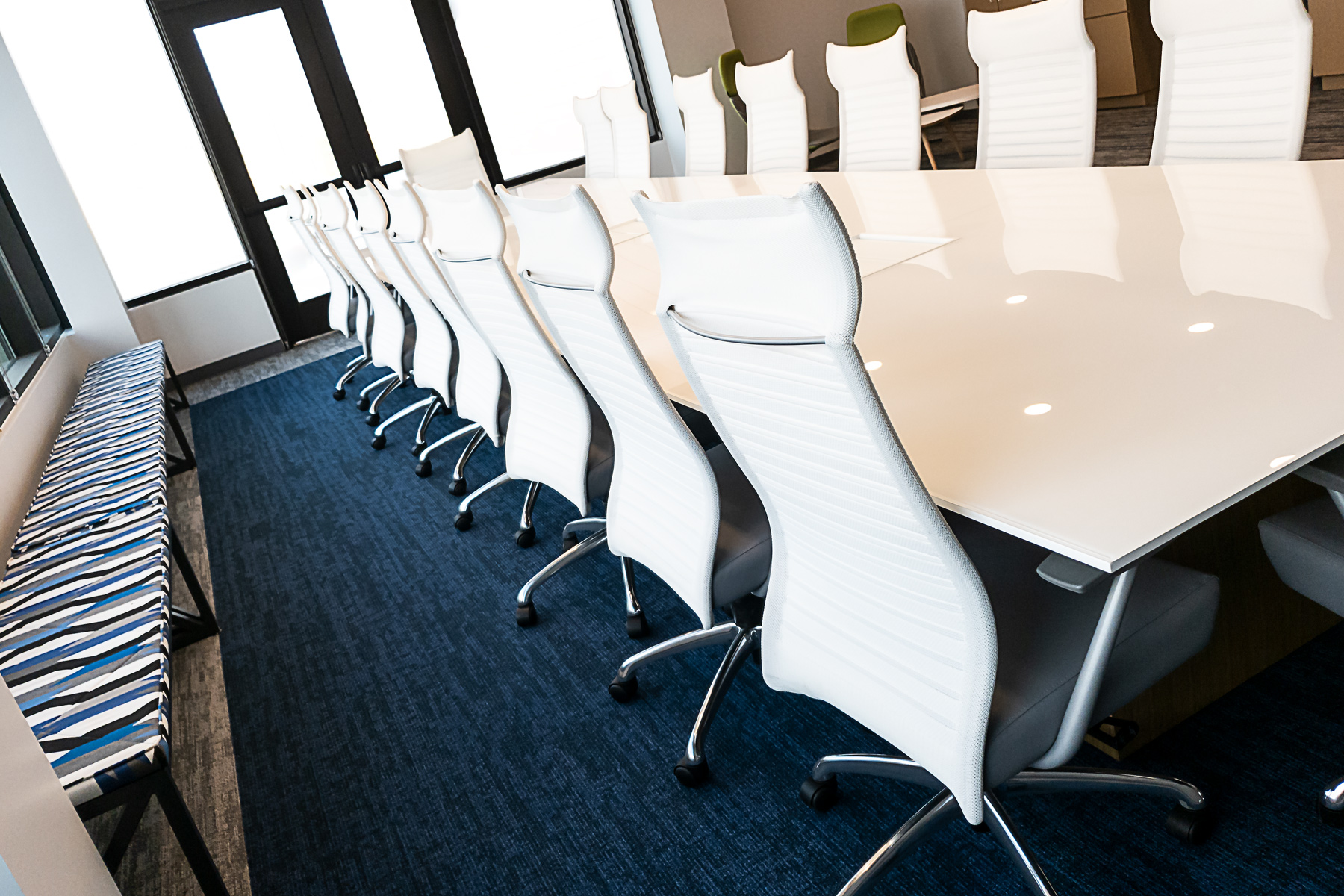 Nucraft® Myne™ Conference Table, Source International® Purl™ Chairs and Kimball® Fixit™ Benches